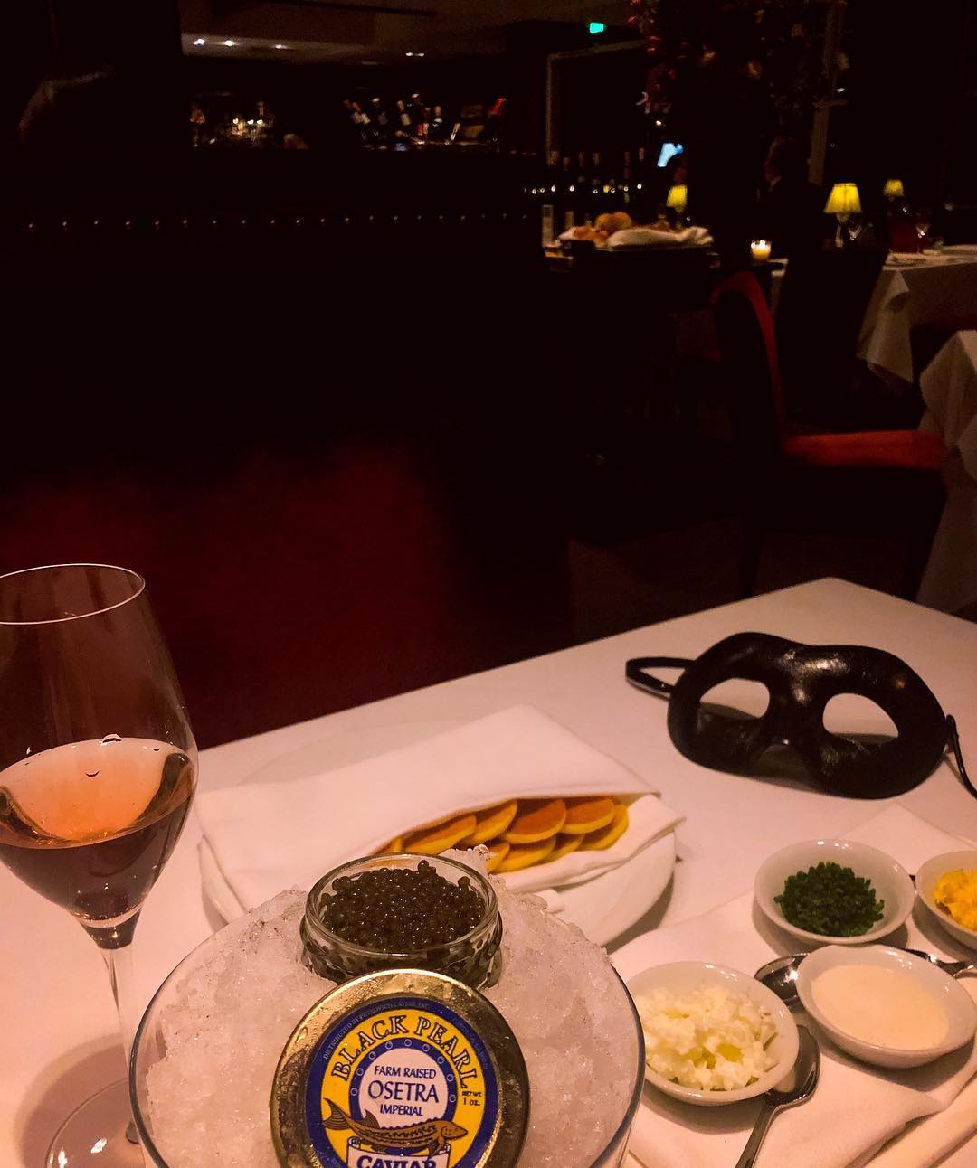 Vanessa Rallonza: Savoring Delightful Meal at Elegant Table