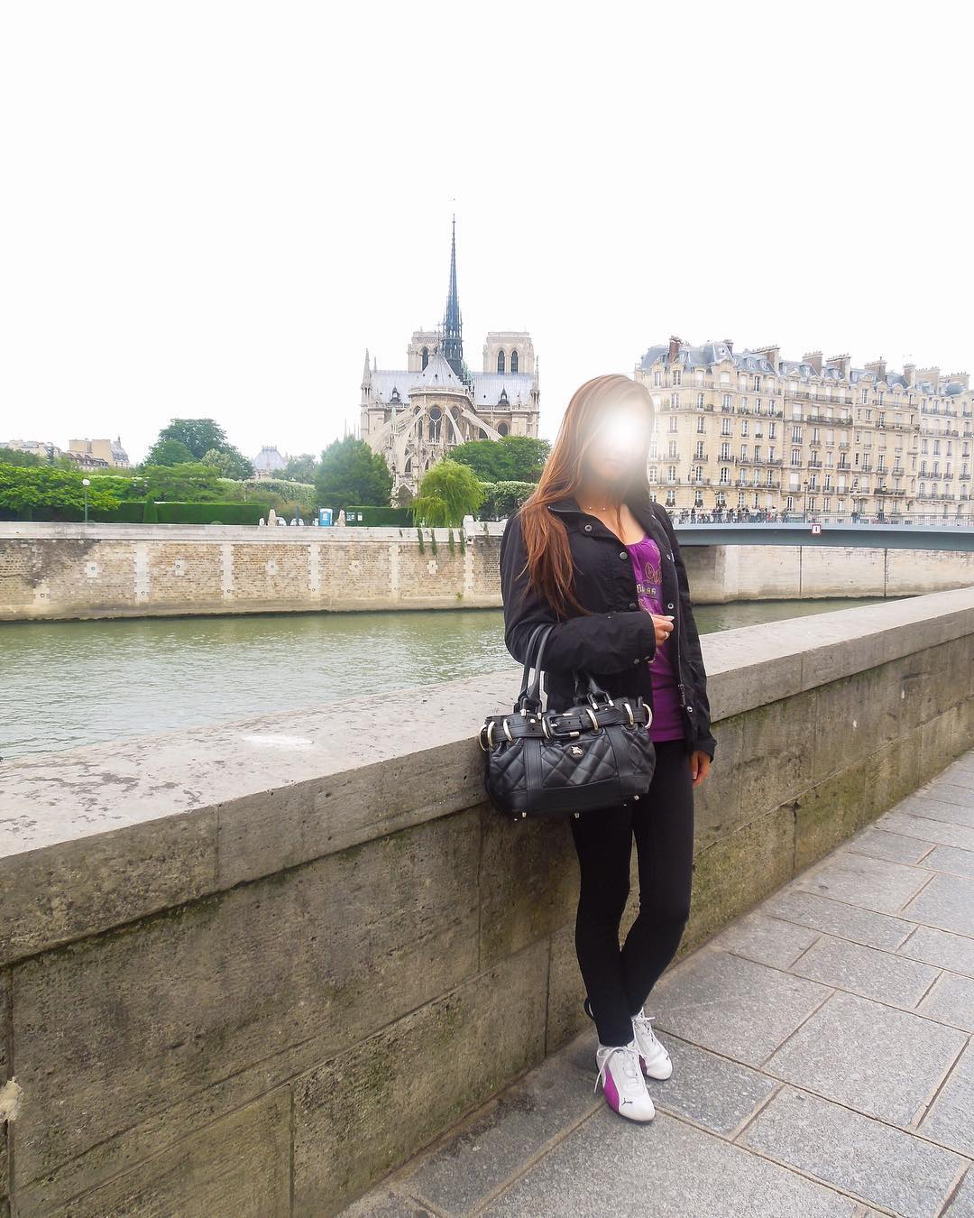 Vanessa Rallonza - Serene Gaze Over Notre-Dame Wall