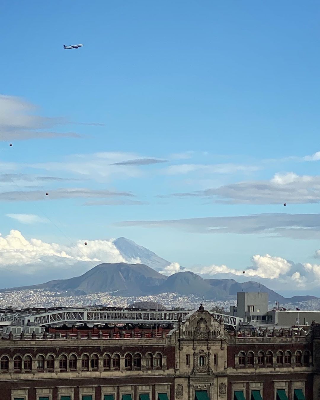 Vanessa Rallonza: Urban Landscape with Soaring Airplane
